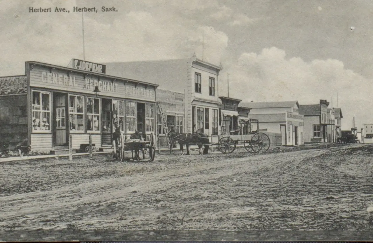 Herbert Avenue, Herbert, with General Merchant store and horse-drawn wagons, about 1910